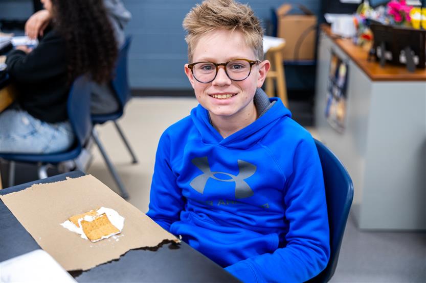 Students do a science experiment